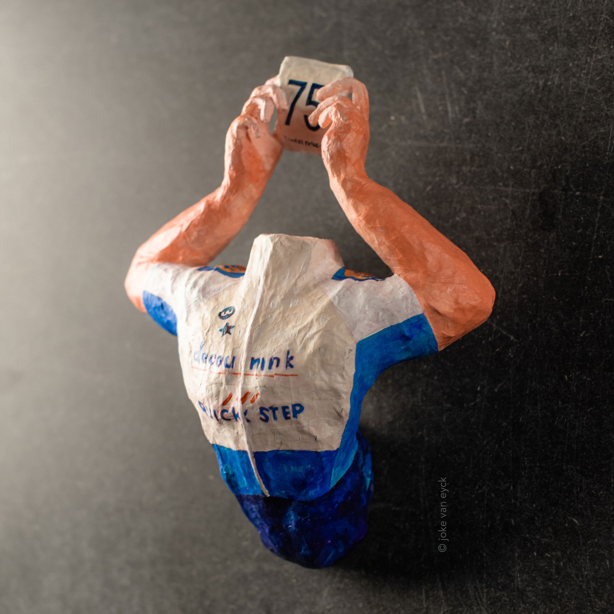 Torso of Remco Evenepoel in 2020. He wins the Tour of Poland and he honours his No 75 teammate Fabio Jakobsen